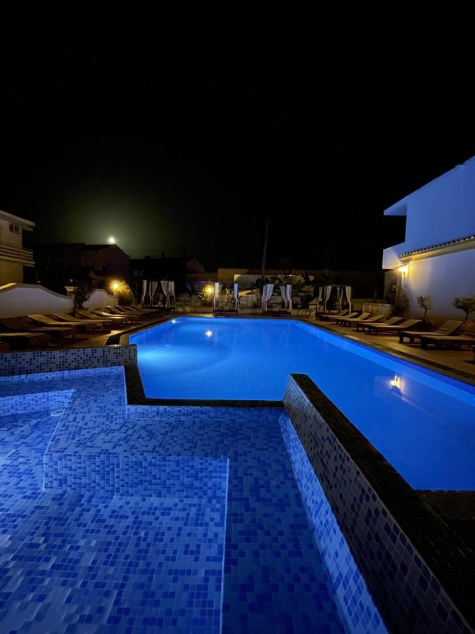 Oasis Beach Club Kávosz Kültér fotó